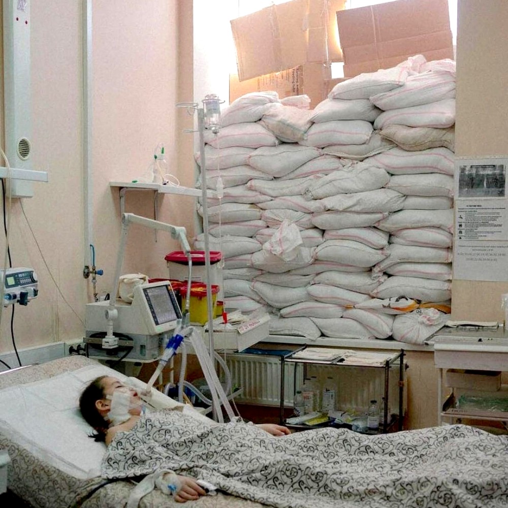 “Hospitals are full of wounded, soldiers and civilians. Children. Stop it, please...